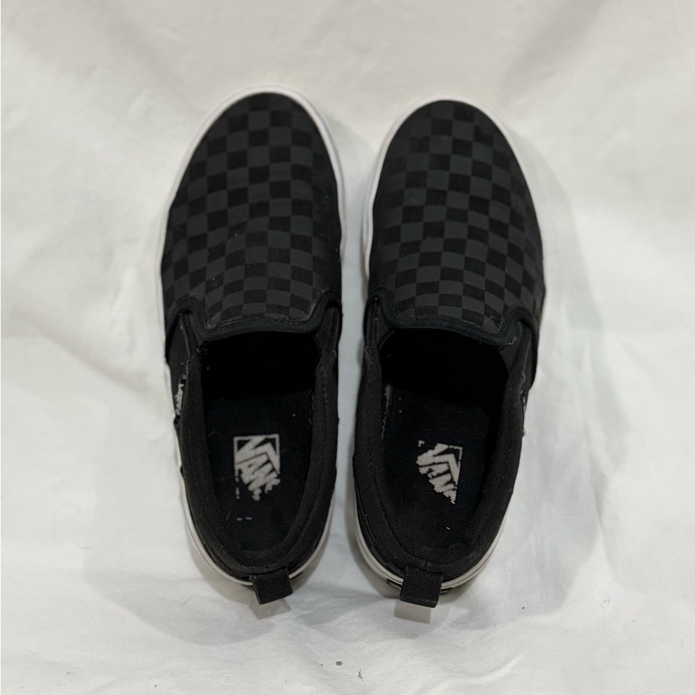 Vans Black Sneakers with Textured Upper and Slip-On Design